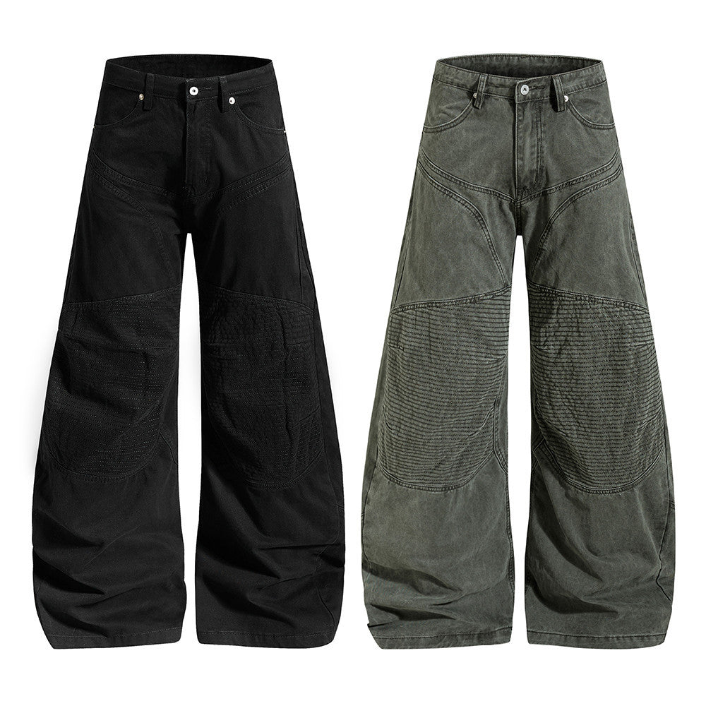 Men's wide-leg deconstructed patchwork pants with arc seams in black and army green, baggy fit streetwear style