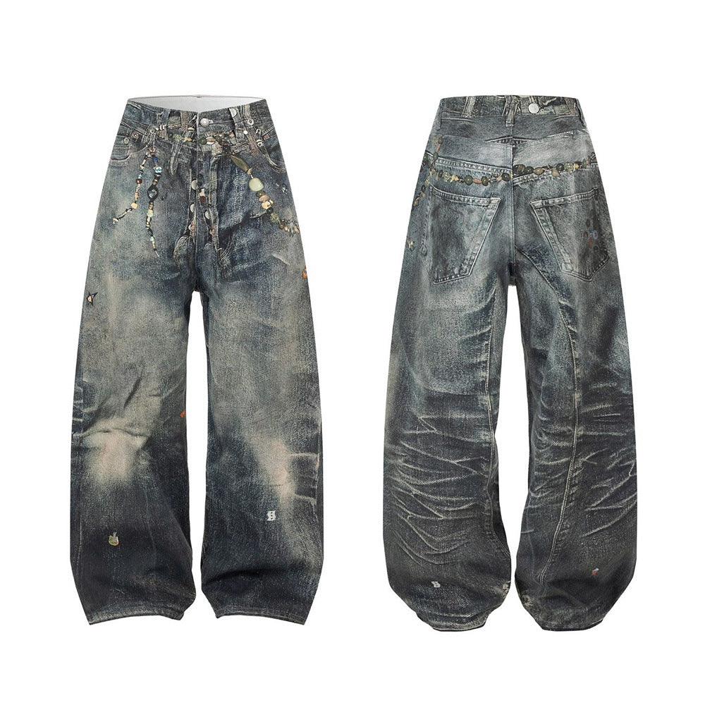 Men's wide-leg vintage dirty-wash jeans with chain and bead embellishments along the waistband, front and back view