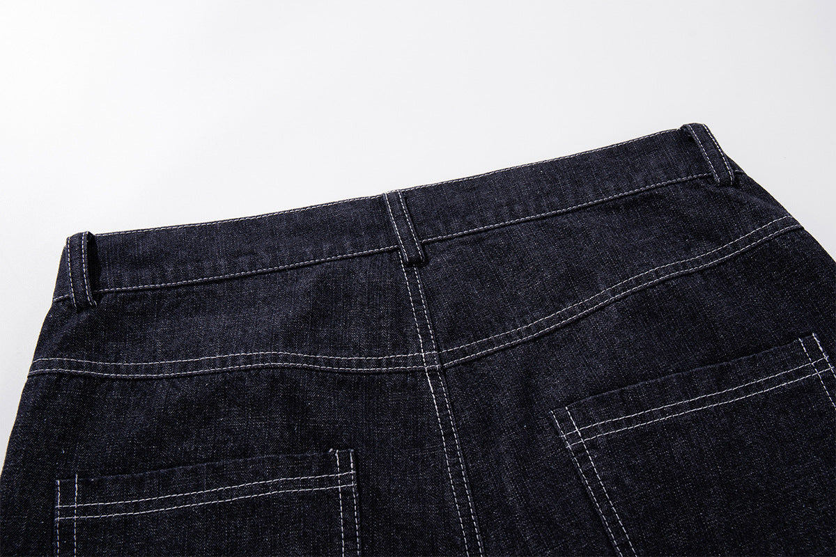 Vaqueros baggy de pierna ancha, lavado oscuro, bragueta diagonal de botones y denim crudo
