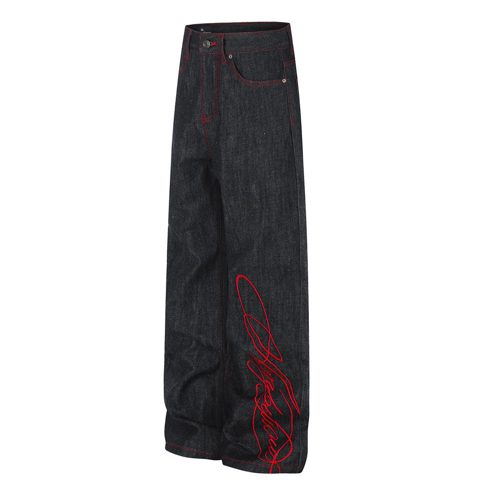 Jean à jambes larges – Denim noir avec surpiqûres rouges contrastantes et broderie script