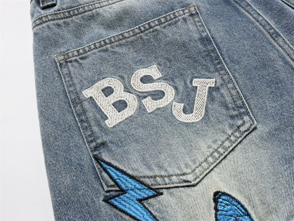 Wide-Leg Jeans with Embroidered Patches – Stars, Butterflies & Roses on Washed