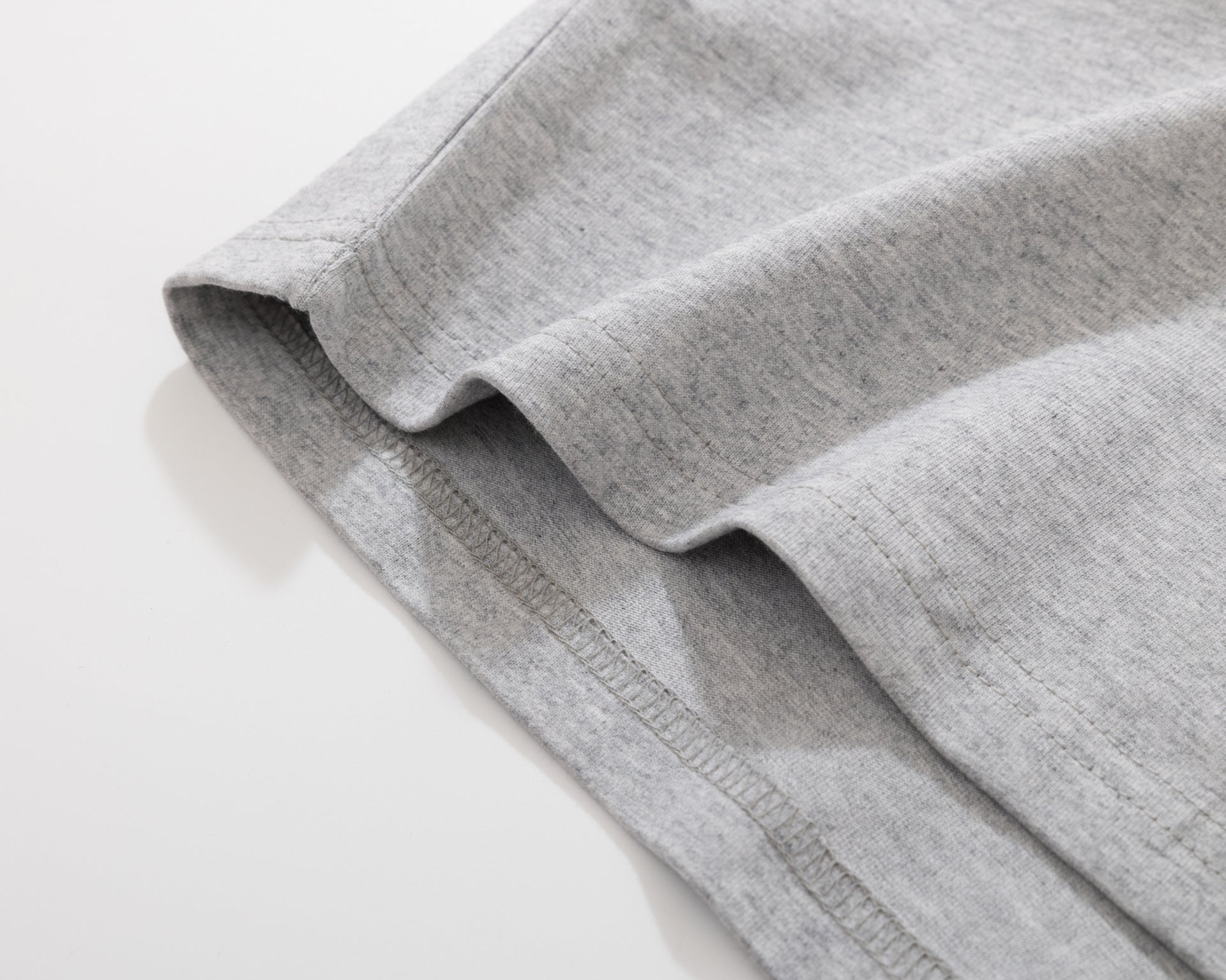 ニューワールド レトロ グラフィック長袖Tシャツ フェイクレイヤード ストライプスリーブ