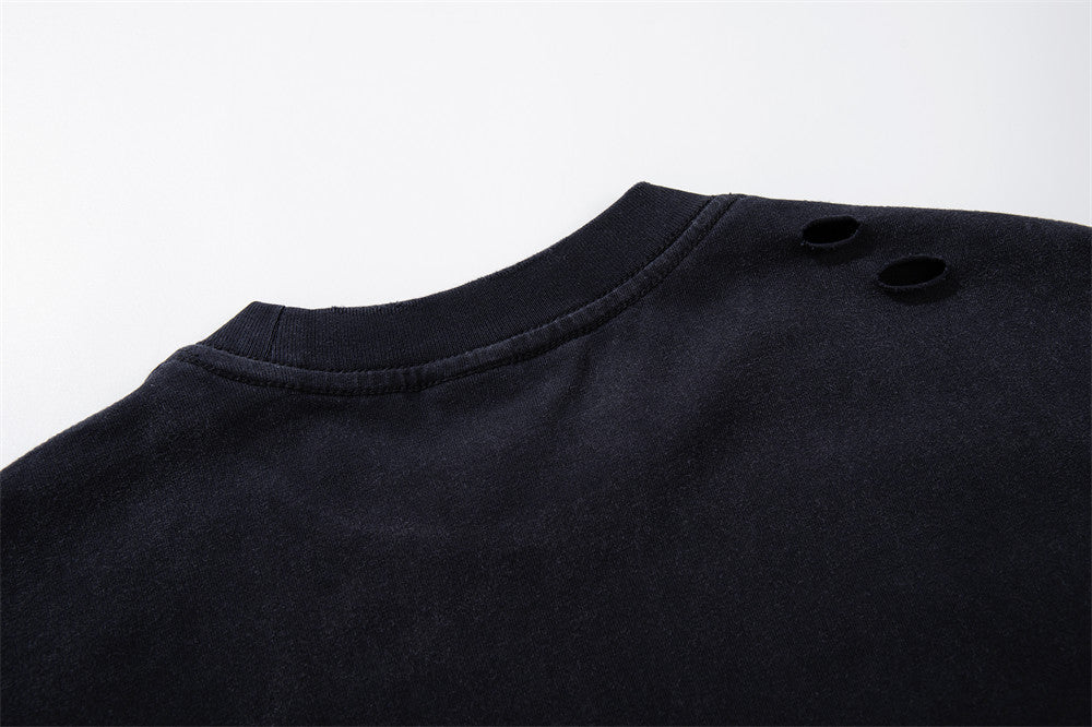 Longsleeve mit dunklen Grafik-Patches – Verwaschenes Oversized-Shirt aus Baumwolle