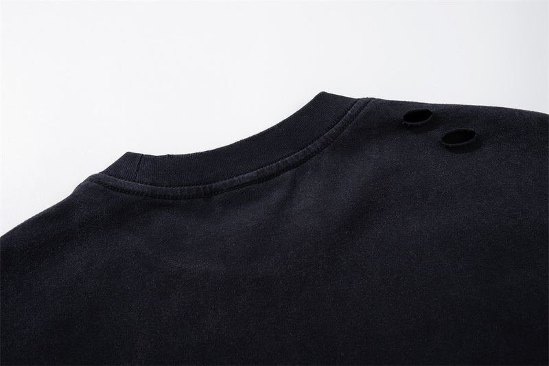 Longsleeve mit dunklen Grafik-Patches – Verwaschenes Oversized-Shirt aus Baumwolle