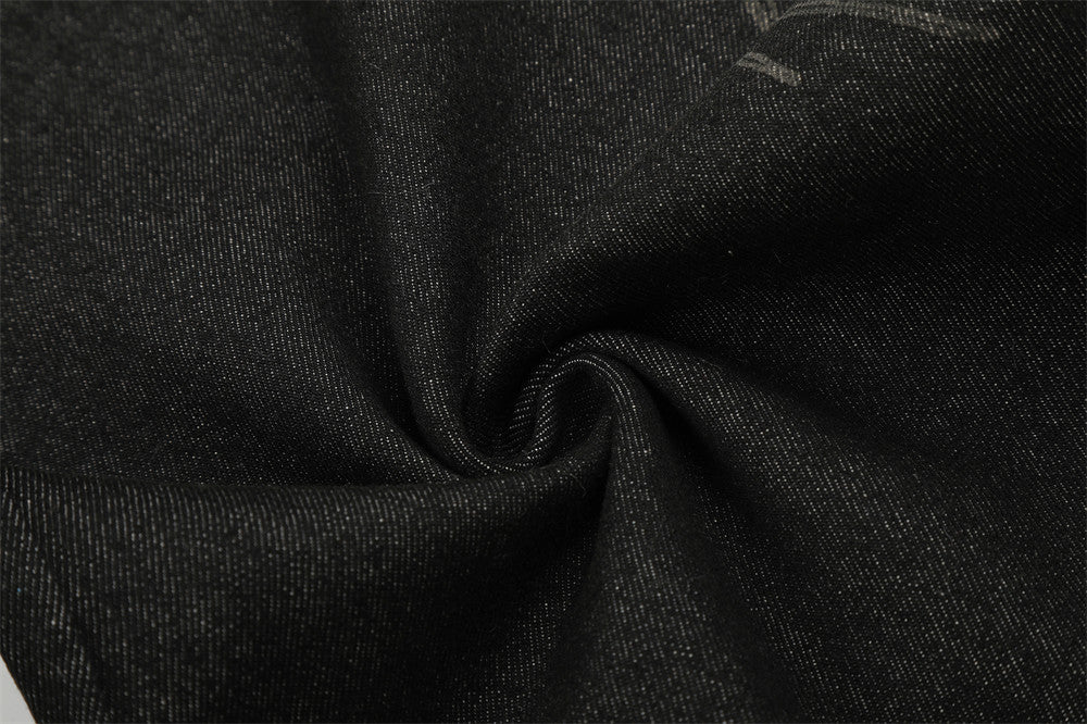 Schwarze Wide-Leg-Jeans mit Kunstfell-Kontrastbund und Nieten-Details