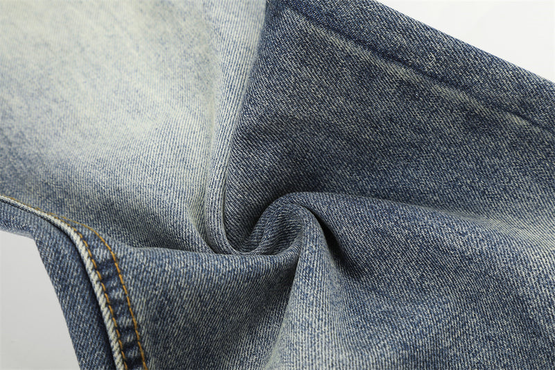 Wide-Leg Straight Jeans – Herrenjeans aus verwaschenem blauem Vintage-Denim mit Destroyed-Details