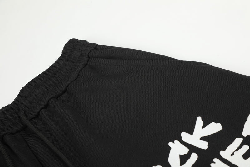 Pantalon de survêtement à jambes larges avec écusson licorne et imprimé graffiti – Streetwear noir