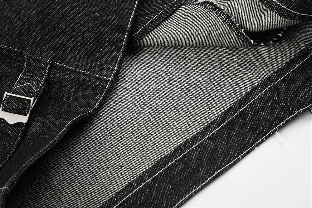 Close-up of black denim jacket lining and inner seam detail