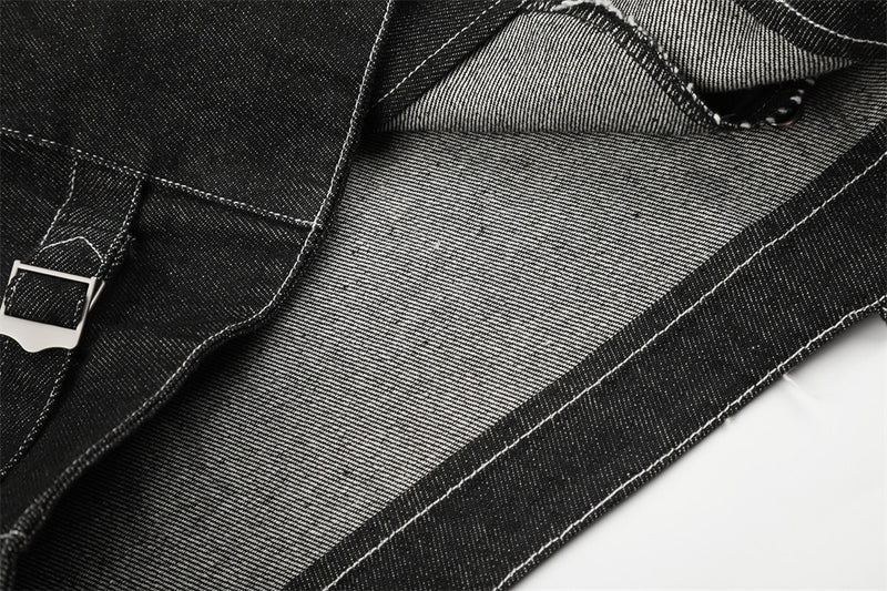 Close-up of black denim jacket lining and inner seam detail
