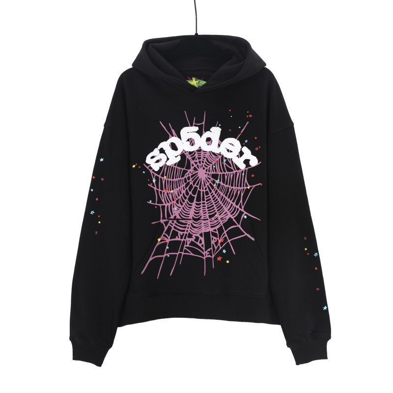 The Chic Black Sp5der Hoodie by Sp5der features a pink web print with bold white &quot;spöder&quot; text and colorful stars along the sleeves, perfectly capturing streetwear fashion. Displayed against a white background, it&