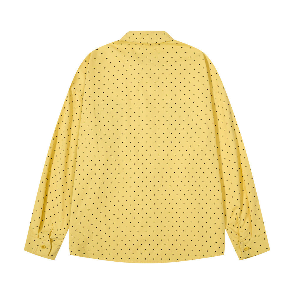 Back view of a yellow long sleeve button-down shirt with black polka dots