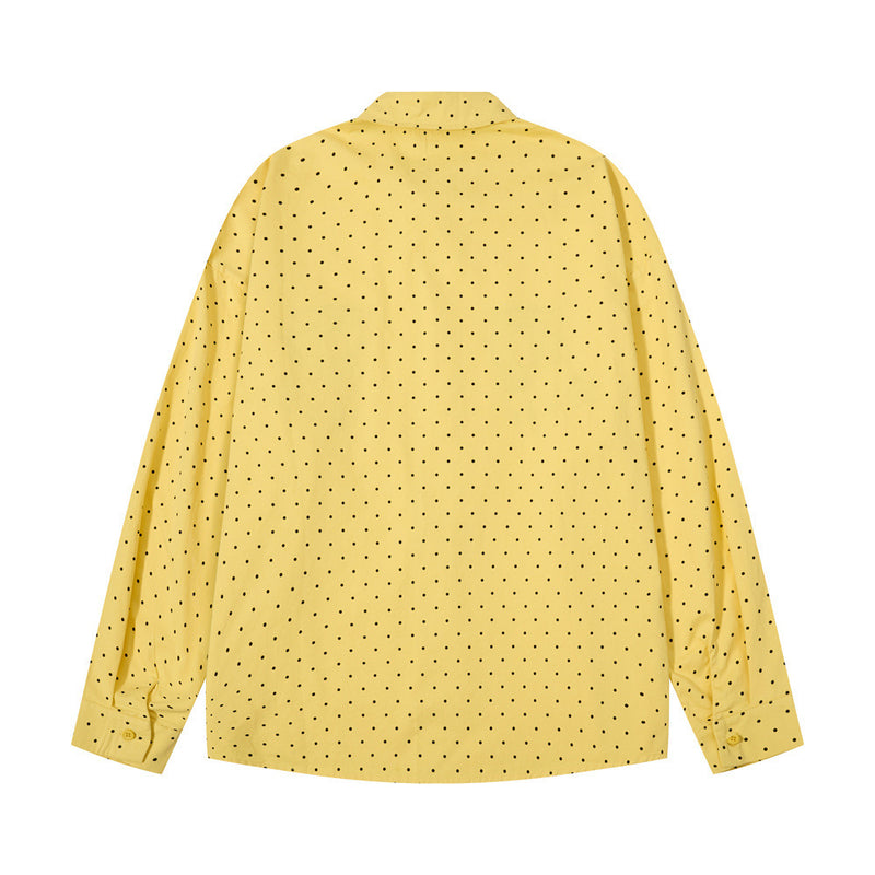 Back view of a yellow long sleeve button-down shirt with black polka dots