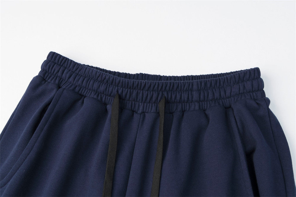 Pantalon de survêtement homme à jambes larges avec écusson brodé et imprimé graphique en écriture