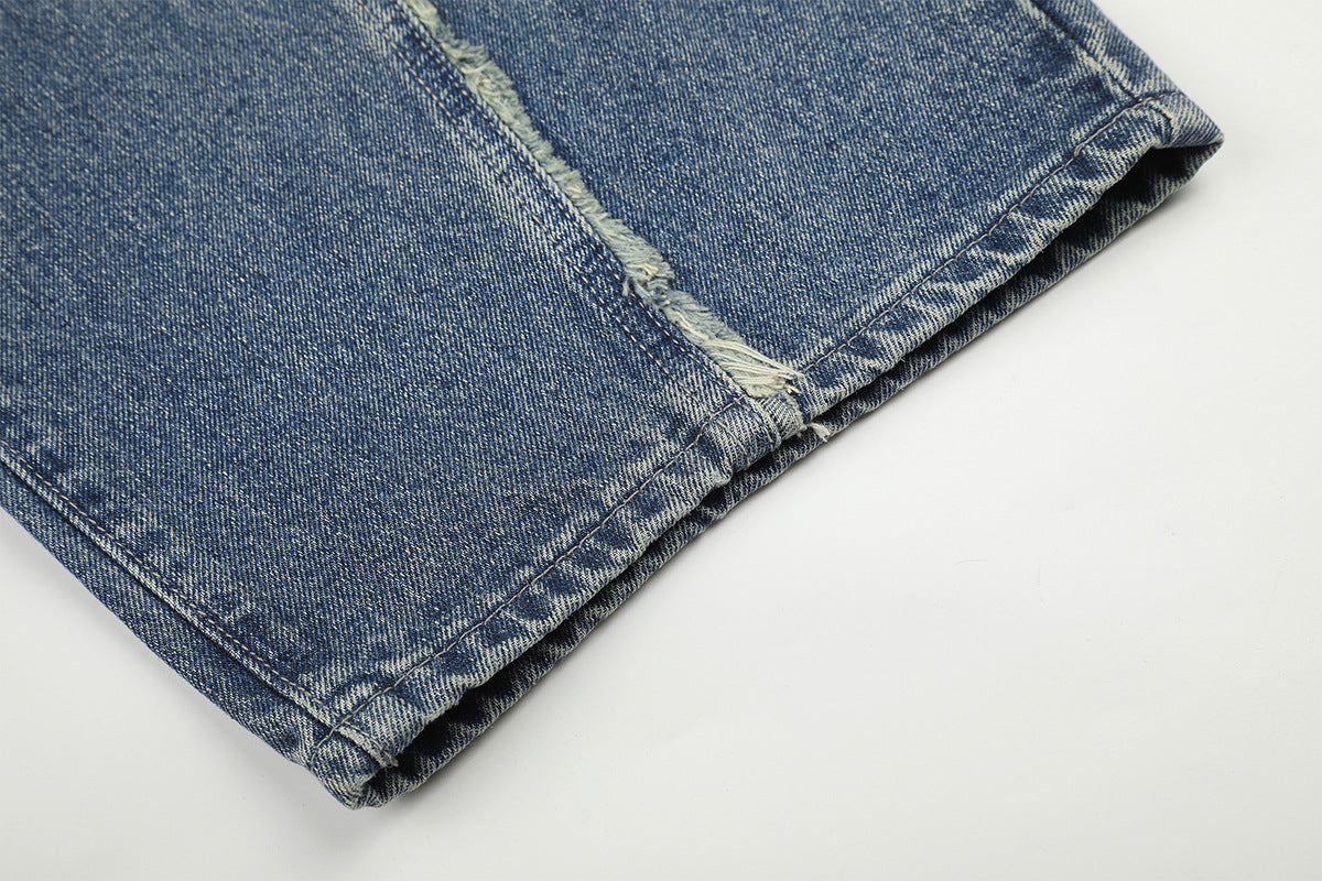 Baggy-Jeans mit weitem Bein, Stern-Patches und offenen Fransennähten