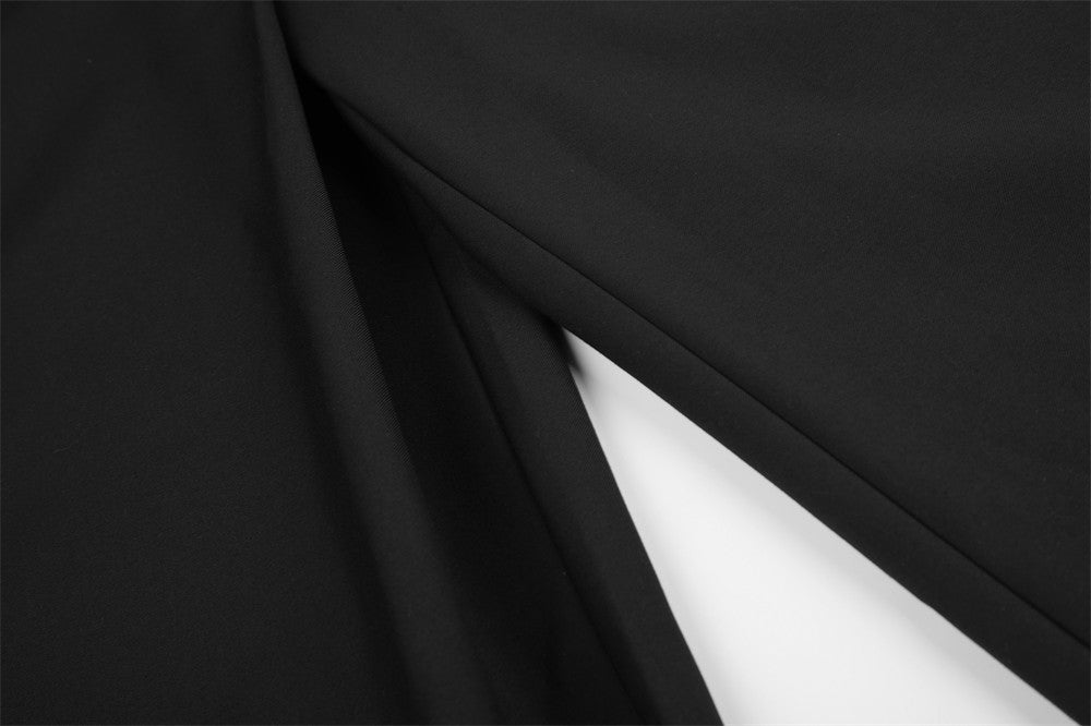 Wide-Leg Pleated Trousers with Diagonal Button Fly