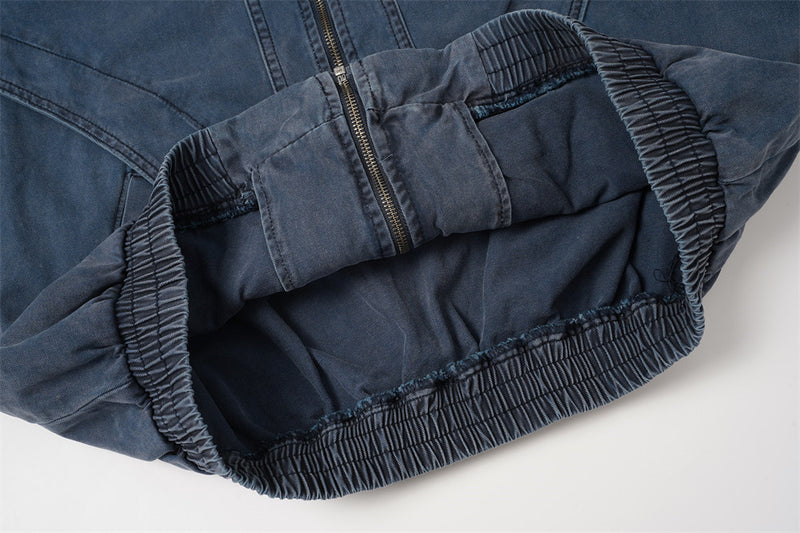 Blouson bomber en jean délavé – Col tissé en PU et coutures déconstruites