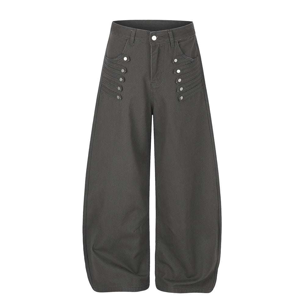 Men's wide-leg barrel pants with decorative metal snap buttons and pintuck detail in dark grey, front view