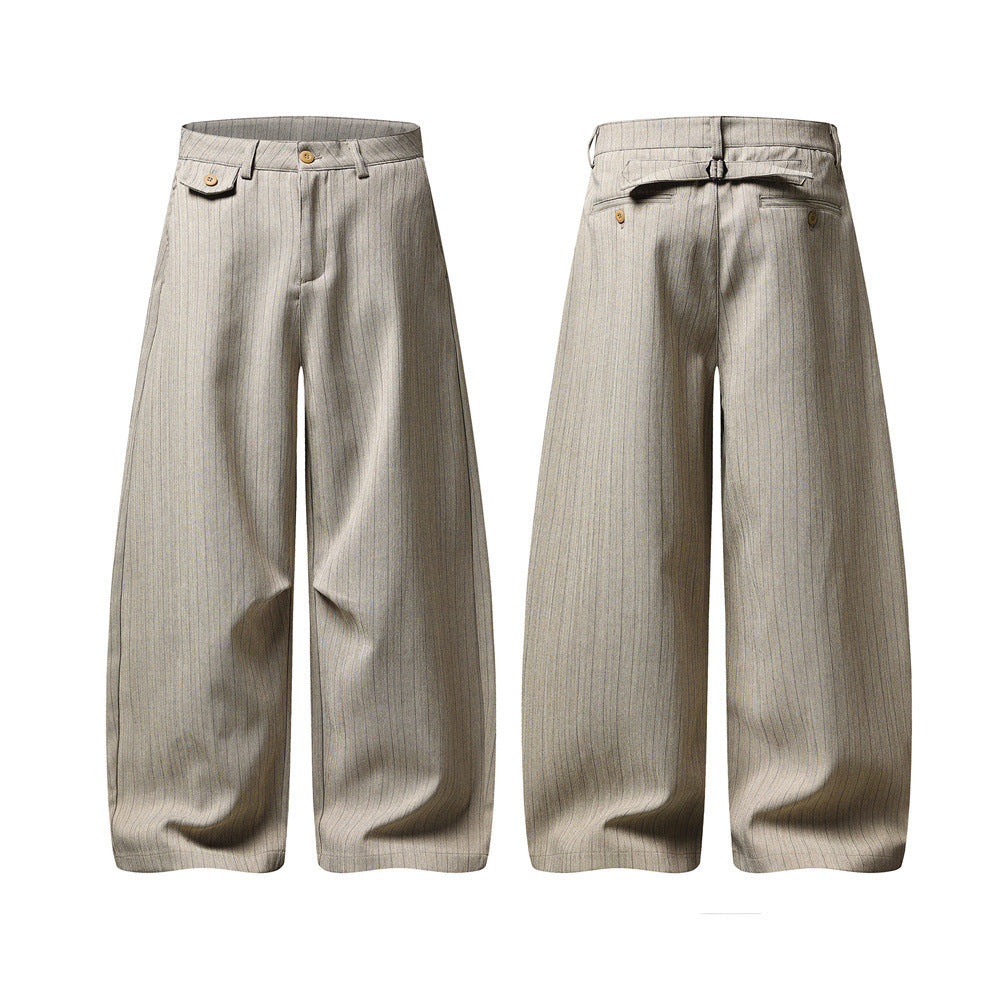 Men's wide-leg grey pinstripe pleated trousers with back cinch buckle, front and back view