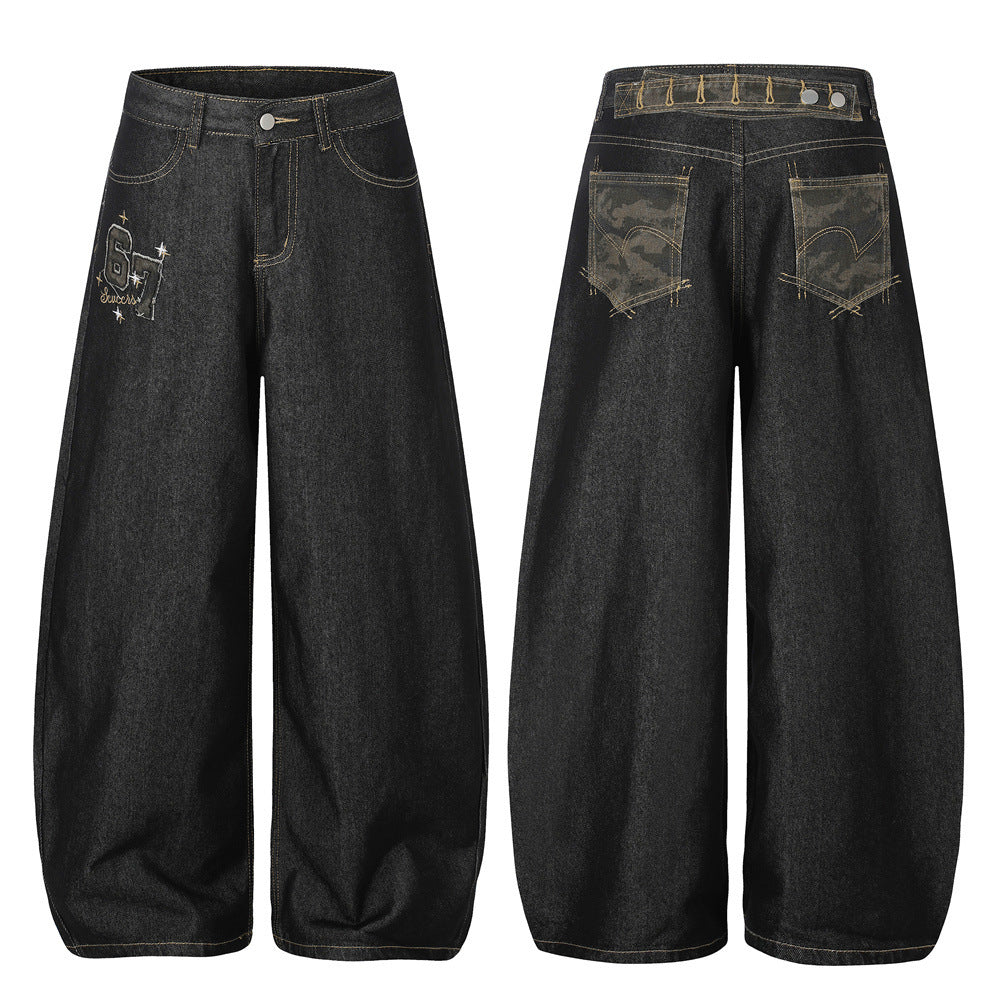 Men's dark black wide-leg barrel jeans with embroidered 67 graphic and camouflage back pocket, front and back view