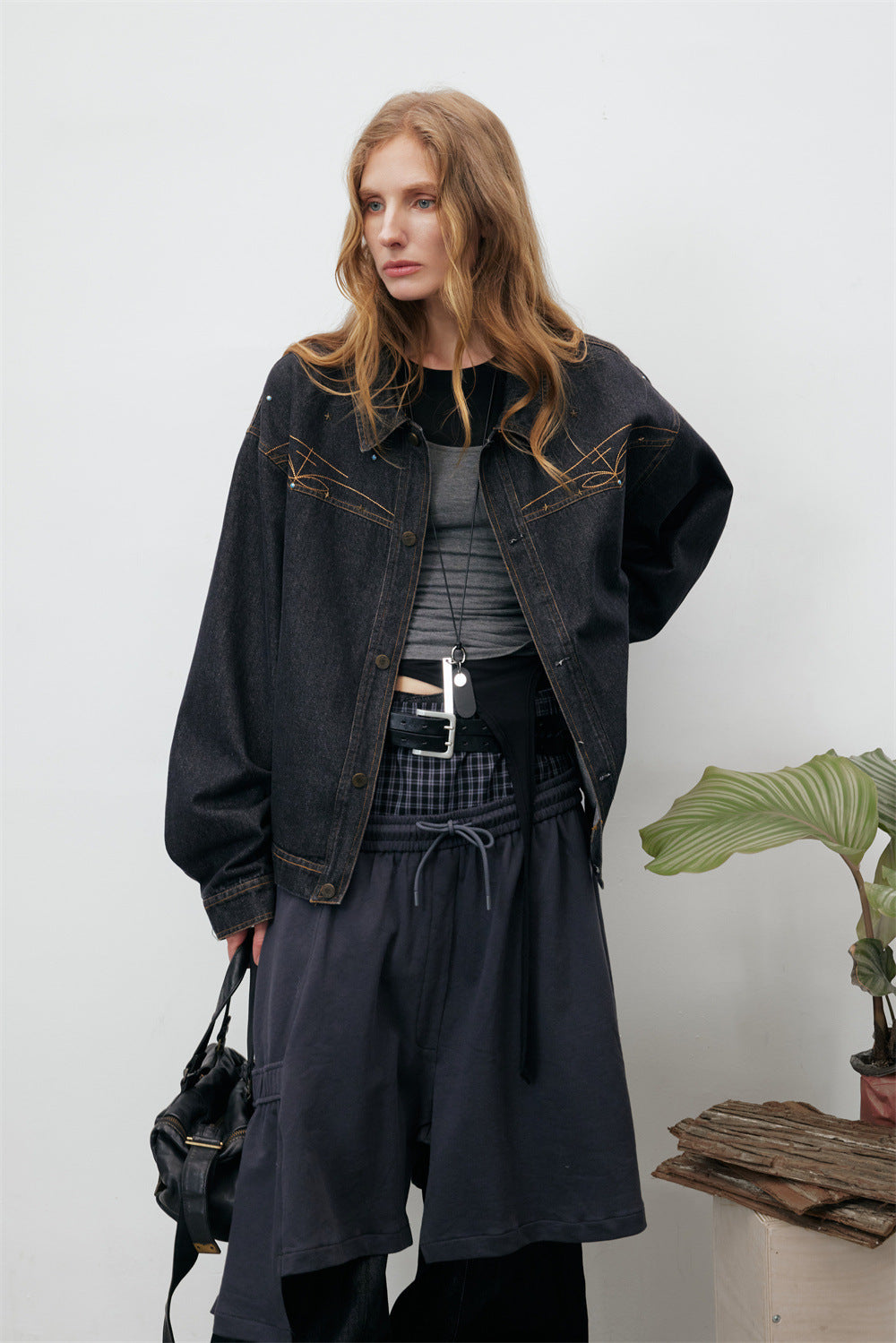 Black Denim Jacket with Embroidered Stitch Detail and Studded Accents