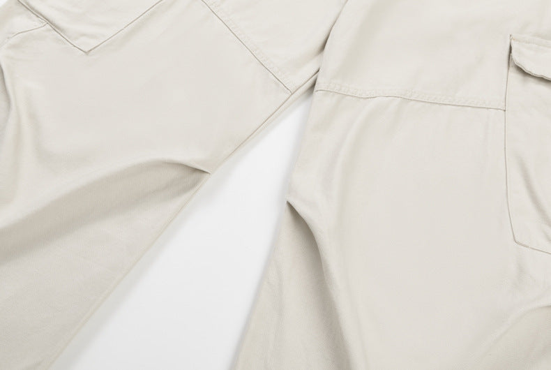 Cream cargo pants close-up of front thigh and pocket seam