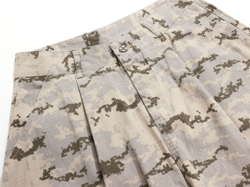 Close-up of desert digital camo waistband, pleats, and front pocket area