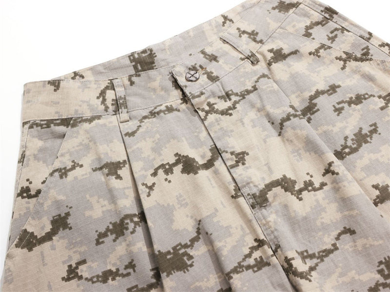 Close-up of desert digital camo waistband, pleats, and front pocket area