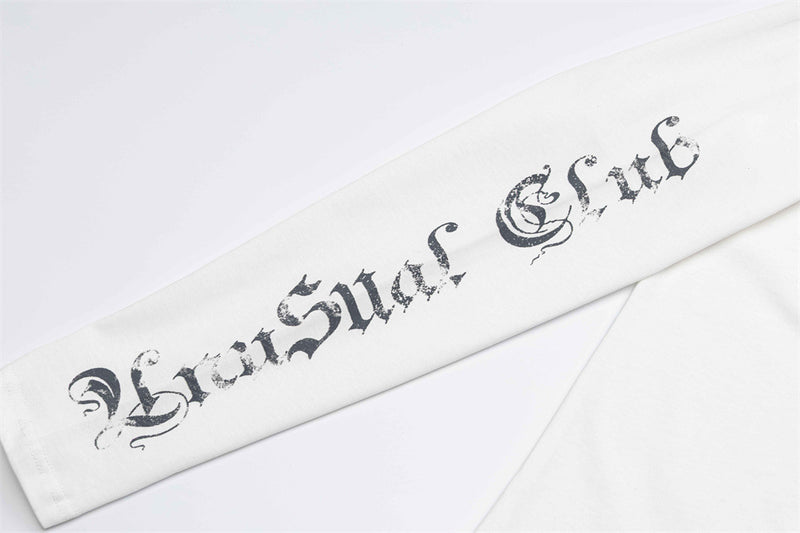 White sleeve close-up with distressed gothic text graphic
