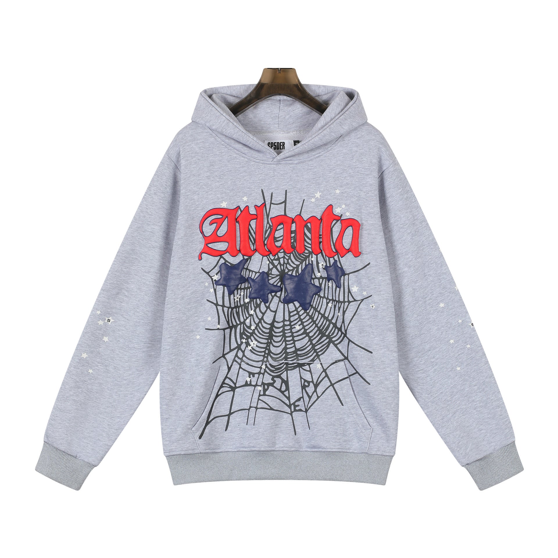 The Sp5der “Atlanta Web” Hoodie in Grey/Red/Navy is a 440GSM heavyweight oversized streetwear pullover featuring bold red "Atlanta" lettering, a black spider web with spiders graphic, and scattered white speckles on the front.