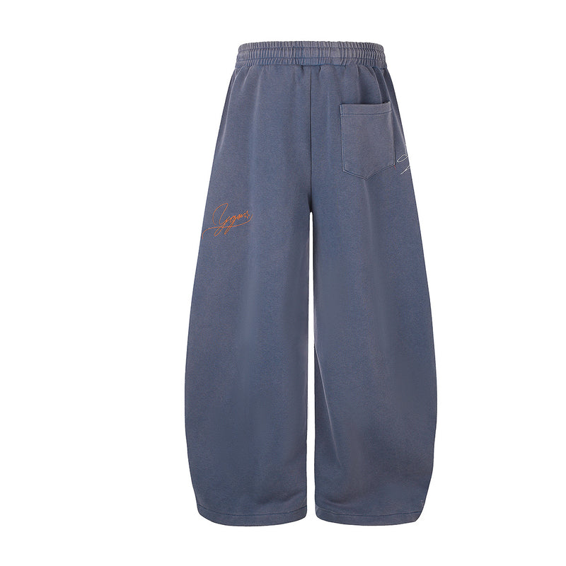 Pantalon de survêtement à jambes larges avec broderies graffiti signature et numéro 26