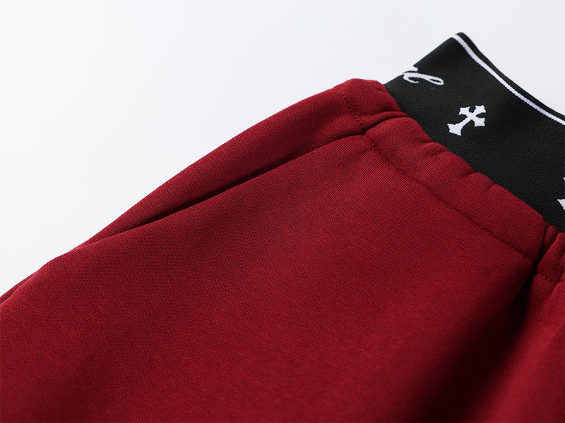 Pantalon de survêtement à jambes larges avec logo cursif et ceinture élastiquée