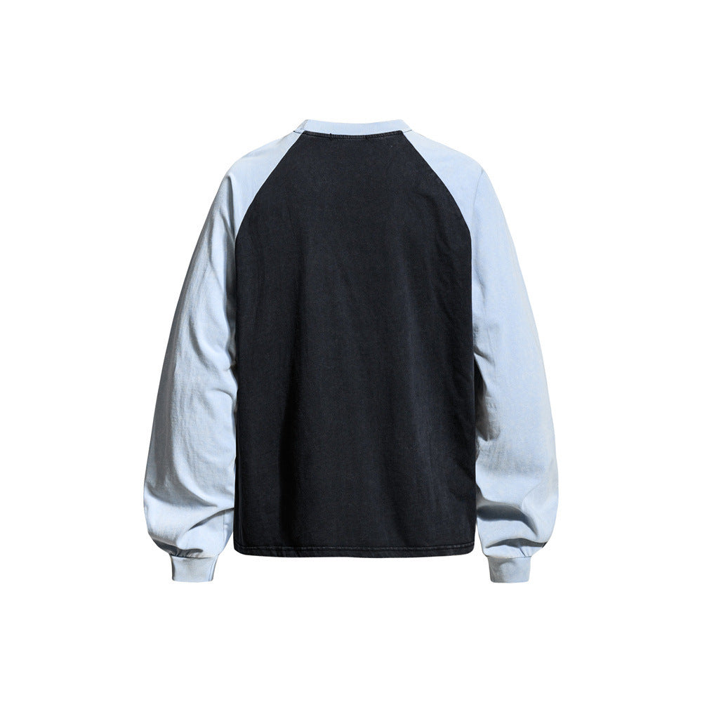 Back view of black raglan long sleeve tee with light blue sleeves and plain back