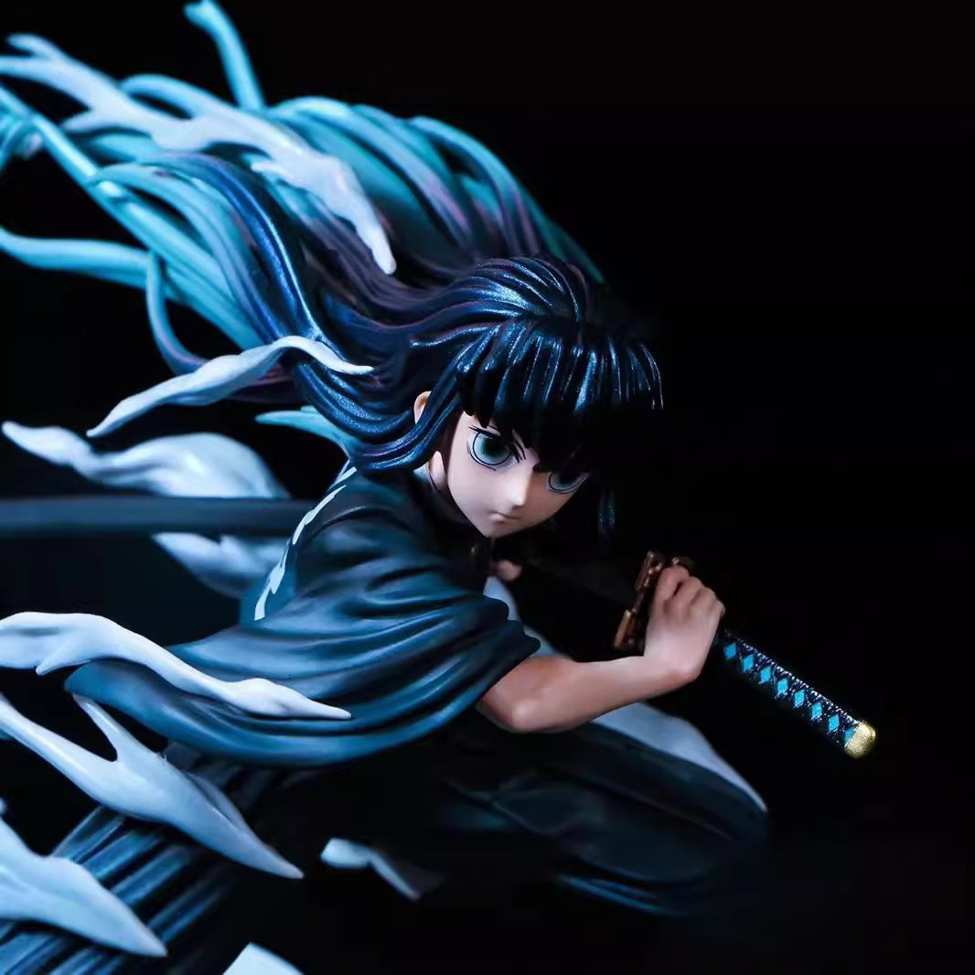 The Muichiro Tokito Demon Slayer Figure is an 18cm premium PVC collectible of a warrior with long hair and a katana, wearing a dark robe. It features dynamic Mist Breathing effects and makes an ideal addition to any Demon Slayer collection.