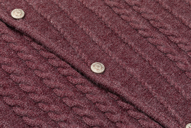 Pull col roulé en maille torsadée avec détail boutonné en diagonale