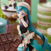 The Hatsune Miku Black Chocolate Pastry Chef 21cm PVC Figure features an anime-style character with blue hair in a detailed chef&