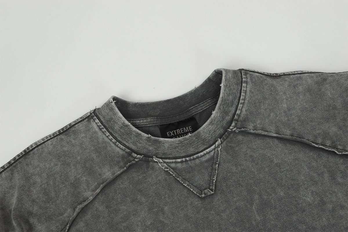 Pull homme gris à col rond – Délavé à l’acide, déstructuré, manches longues à bords bruts