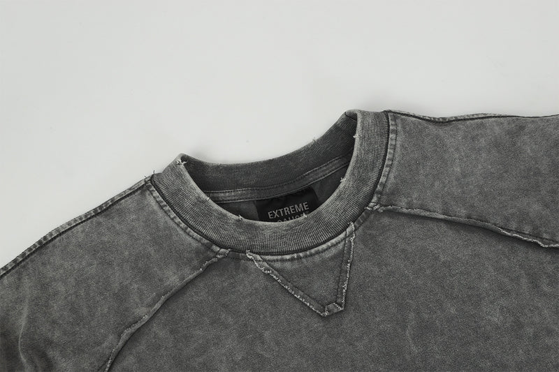 Pull homme gris à col rond – Délavé à l’acide, déstructuré, manches longues à bords bruts
