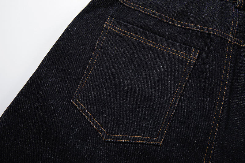 Vaqueros baggy negros con inserciones de estampado de leopardo y corte de pierna ancha