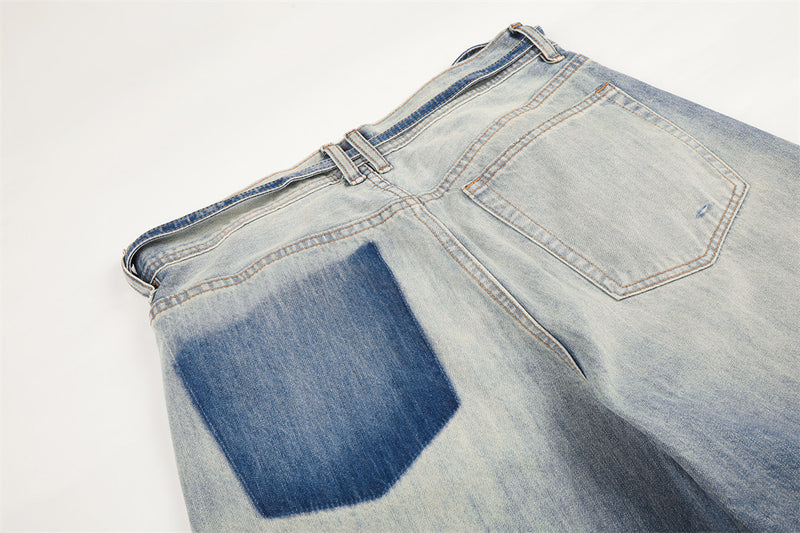 Wide-Leg Distressed Jeans – Gradient Washed Denim with Ripped Details