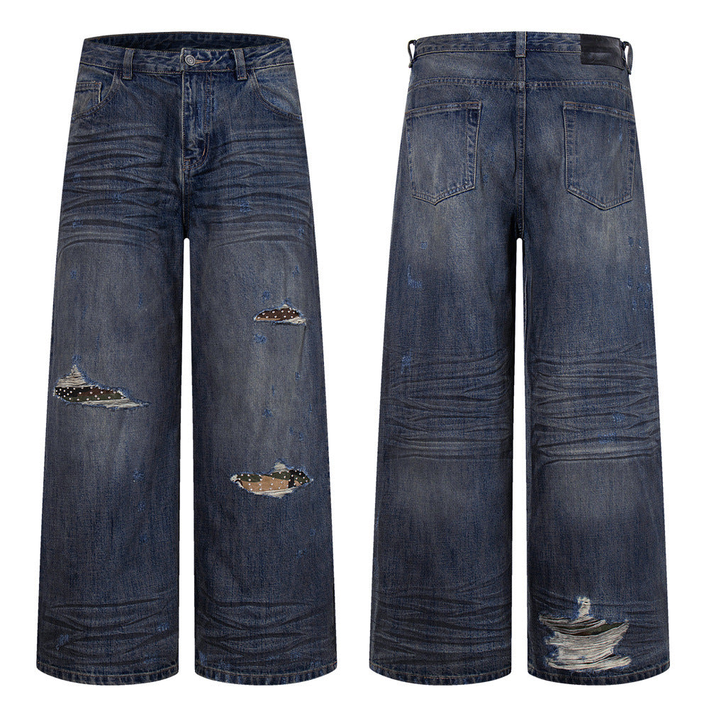 Wide-Leg Ripped Jeans – Vintage Washed Distressed Denim with Studded Patches