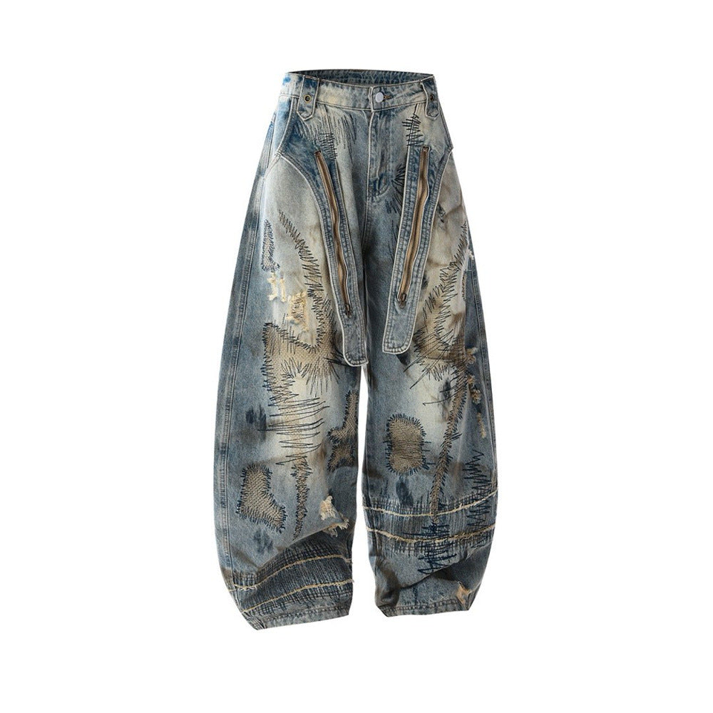 Baggy Wide-Leg Jeans – Chaotic Embroidery, Distressed Denim & Arc-Hem Design