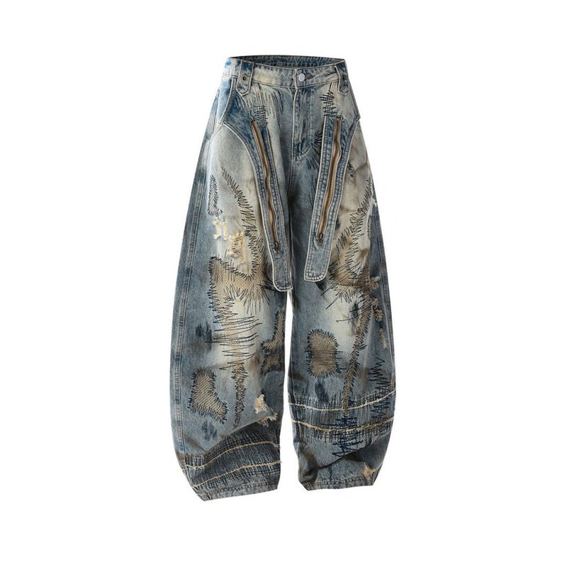 Baggy Wide-Leg Jeans – Chaotic Embroidery, Distressed Denim & Arc-Hem Design