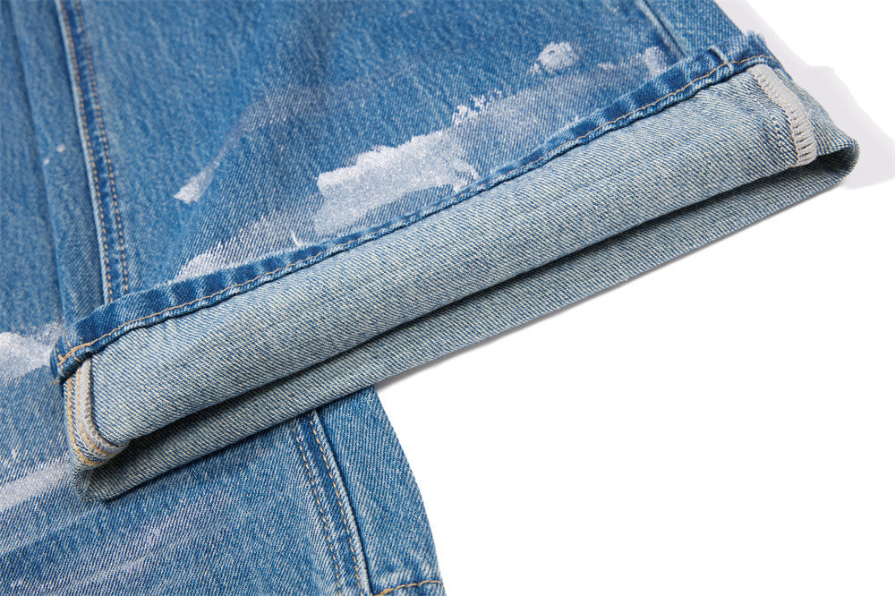Distressed Flare Jeans – Men's Washed Blue Wide-Leg Denim with Paint Splatter