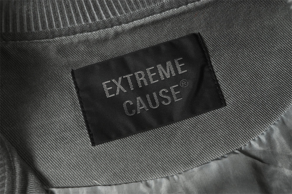 Blouson bomber déconstruit en patchwork – Toile délavée et coutures brutes