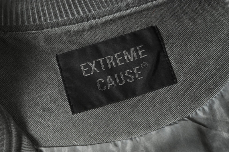 Blouson bomber déconstruit en patchwork – Toile délavée et coutures brutes