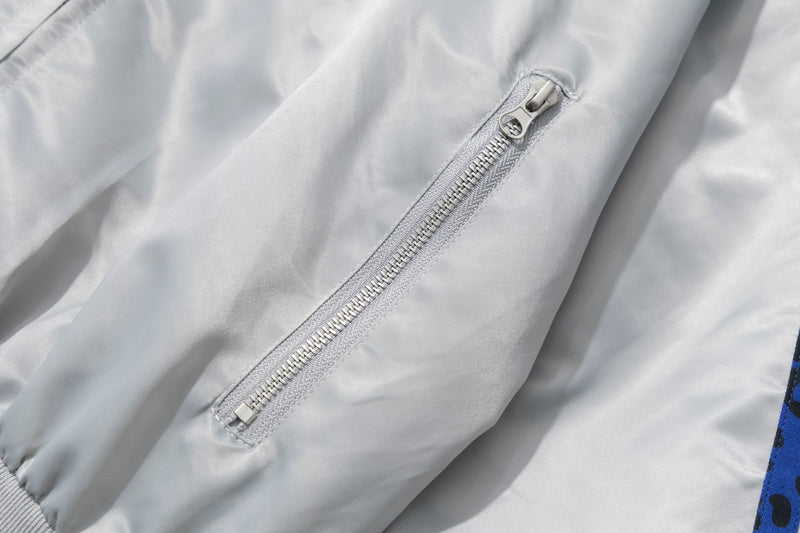Blouson bomber satiné brodé à col montant et bandes léopard