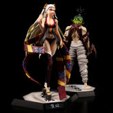 Two anime figures stand back-to-back on hexagonal bases: a female with long blonde hair in a red and black outfit, resembling a Daki Demon Slayer Figure, and a male with green hair, bandages, and dark pants. Both are intricately detailed 28CM PVC action figures from the Kimetsu no Yaiba collection.