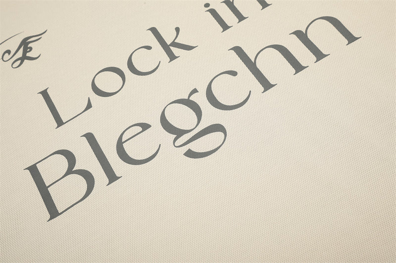 Beige tee print detail showing Lock in Blegchn text and script logo