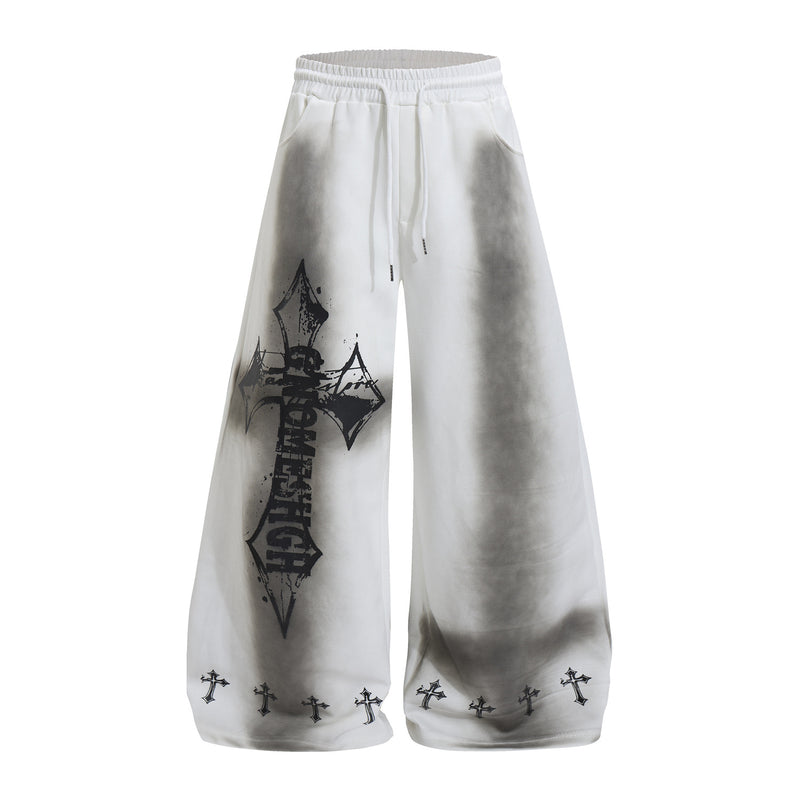 Pantalon de survêtement à jambes larges avec croix gothique et finition délavée