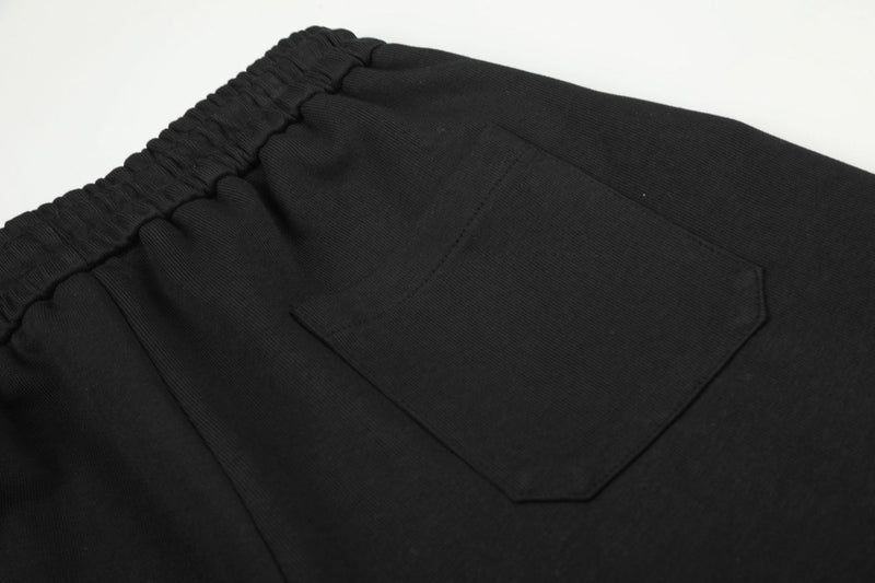 Pantalon de survêtement à jambes larges avec écusson licorne et imprimé graffiti – Streetwear noir